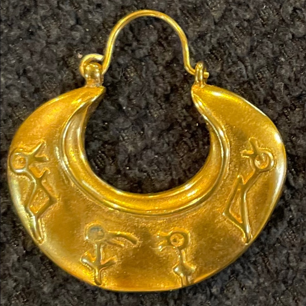 Gold toned earrings with small hieroglyphs. Never worn. EUC